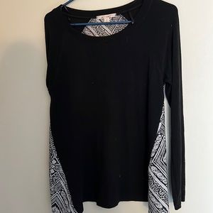 Light black sweater with fun back pattern.